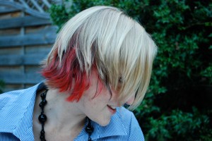 Hair dyed red and black