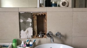 hole in bathroom wall
